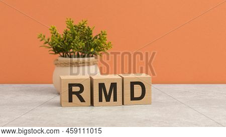 Word Rmd On Wooden Cubes. Beautiful Orange Background. Business Concept. Copy Space. Rmd - Short For