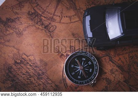 Tourist Travel By Car. Travel By Car. Compass And Car. Autotourism. Traveling Across Countries By La