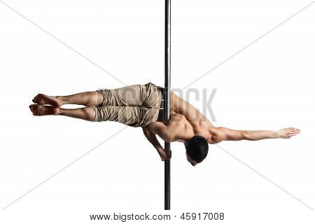 Giovane forte pole dance uomo isolato