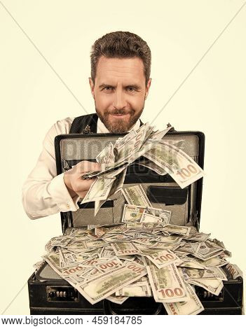 Smiling Businessman With Money Case. Investor Hold Case With Dollars Cash