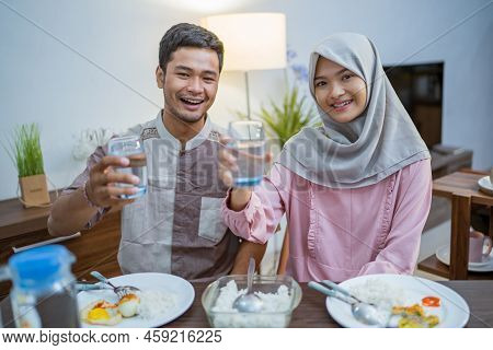 Muslim Couple Having Breakfast Or Sahur Early Morning