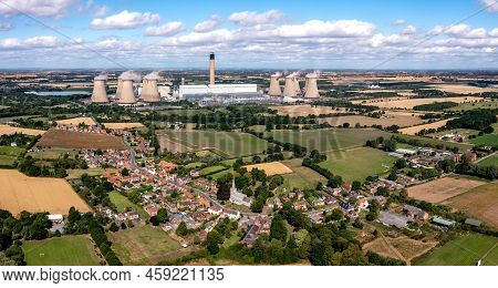 Aerial Landscape View Of Drax Power Station In North Yorkshire With Smoking Chimneys And Cooling Tow
