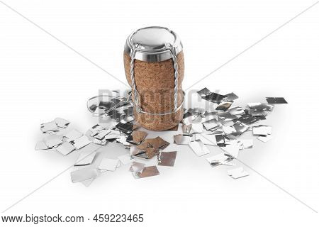 Cork Of Sparkling Wine With Muselet Cap And Shiny Silver Confetti On White Background