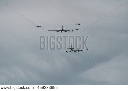 Russia, St. Petersburg, 28 July 2022: Military Aircraft And Helicopters Of The Air Force Fly On The 