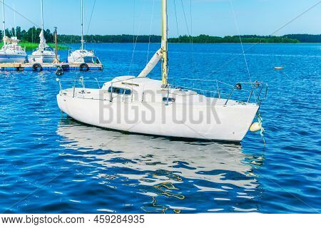 White Yacht With The Blue Sea Water At Summer Day.plateliai,lithuania.08-03-2022.