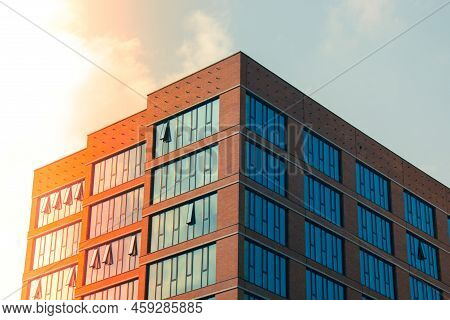 Exterior Of Modern Architecture. Black Windows, The Facade Of A Modern Office Building, A Shopping C