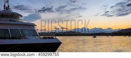 Boat And Water Panoramic Landscape Orange Cloudy Sky Boats On Memphremagog Lake In Magog Quebec