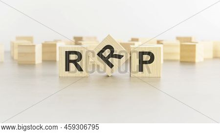 Word Rrp Is Made Of Wooden Blocks On White Background