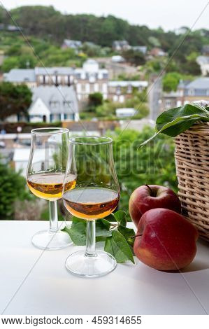 Tasting Of Strong Alcoholic Drink Calvados Made From Apples In Normandy, Calvados Region, France