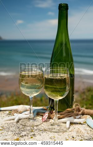 Tasting Of Txakoli Or Chacolí Slightly Sparkling Very Dry White Wine Produced In The Spanish Basque