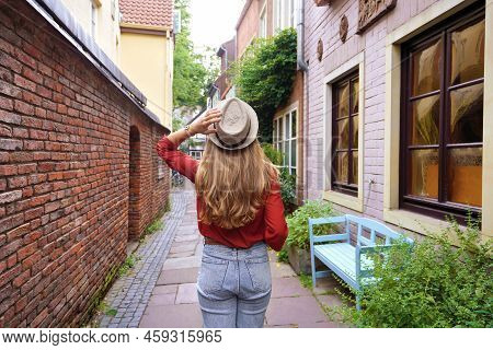 Beautiful Tourist Girl Strolling In Schnoor Neighborhood, Bremen, Germany