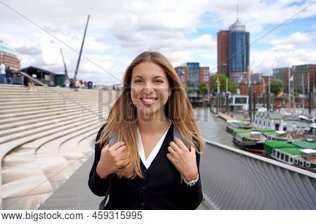 Beautiful School Exchange Girl Visiting Northern Europe Within The Exchange Program. Looks At Camera