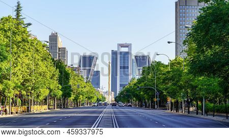 Madrid, Spain - July 30, 2022: Paseo De La Castellana In Madrid With Tall Company Headquarters Build
