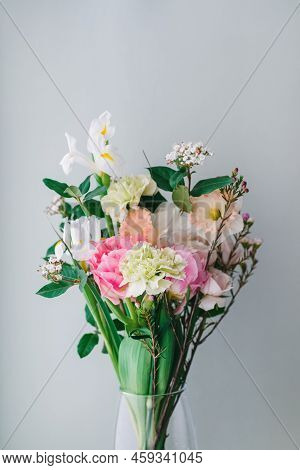 Beautiful Bouquet Of Carnations, Daffodils, Spray Roses, Chamelacium Hookata And White Irises On Gra