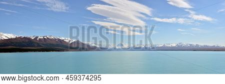 Mount Cook In The Backgtound, Centre. Lake Pukaki In The Foreground On A Spring Day, Otago, New Zeal
