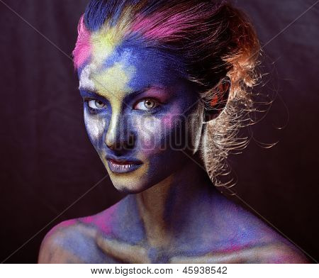 beauty woman with creative make up like Holy celebration in India