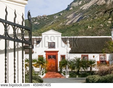 Stylish Building Facade In Cape Dutch Architectural Style In South Africa.