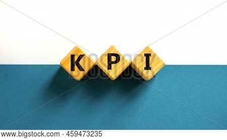 Kpi, Key Performance Indicator Symbol. Concept Word Kpi, Key Performance Indicator On Wooden Cubes O