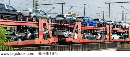 Mane New Modern Electric And Fuel Cars Transportation By Cargo Freight Train Railway Wagon. Railroad