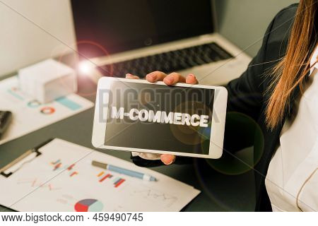 Sign Displaying M Commerce. Business Approach Commercial Transactions Conducted Electronically By Mo