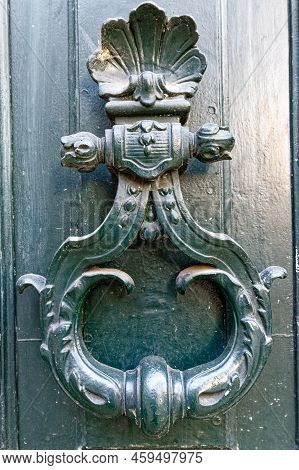 European Vintage Old Metal Wrought Iron Door Knocker. Design Detail. Paris.