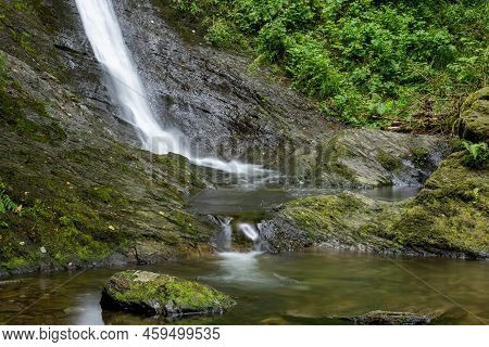 Long Exposure Of The White Lady Waterfall On The River Lyd At Lyford Gorge In Devon