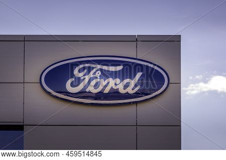 Vilnius, Lithuania- July 29, 2022: Ford Logo On A Dealerships Building. The Ford Motor Company Is Am