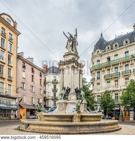 Grenoble, France - June 27,2022 - View At The Foubtain Of The Three Orders In The Streets Of Grenobl