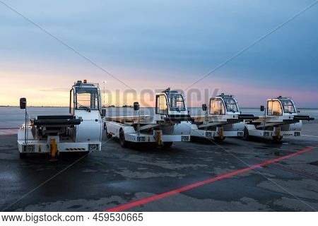Airport Self-propelled Conveyor Belt Loaders At The Evening