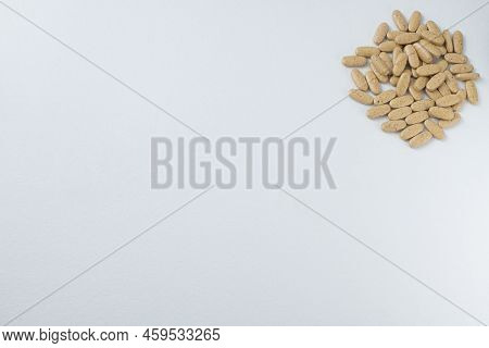 Brown Pills, Medicine Isolated On White Background, Top View