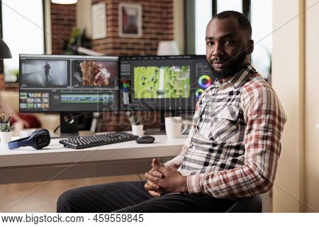 Portrait Of Graphic Editorworking On Video Editing Software To Make Film Montage, Creating Movie Foo