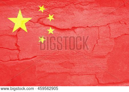 Defocus China Flag, Official Colors And Proportion Correctly. National China Flag. Stone Wall Backgr