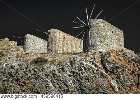 Windmills Of The Lasithi Plateaus At Crete Island - Greece