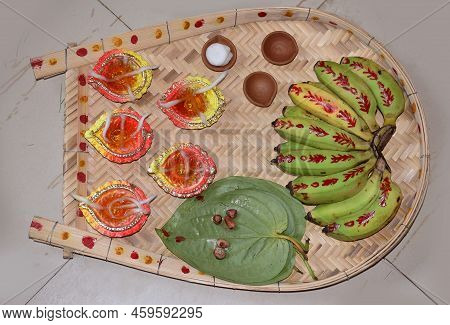 Bamboo Tray With Earthen Lamps, Beetle Leaves And Bananas Used For Religious Purpose During Indian W