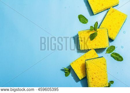 Bright Yellow Sponges For Washing Dishes. Organic Cleaning Concept, Minty Freshness