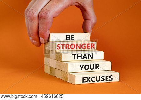 Be Stronger Symbol. Concept Words Be Stronger Than Your Excuses On Wooden Blocks On A Beautiful Oran