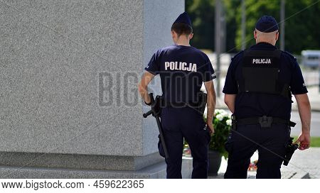 Warsaw Poland. August 10, 2022. Police Officers Guarding The Monument To Lech Kaczynski.