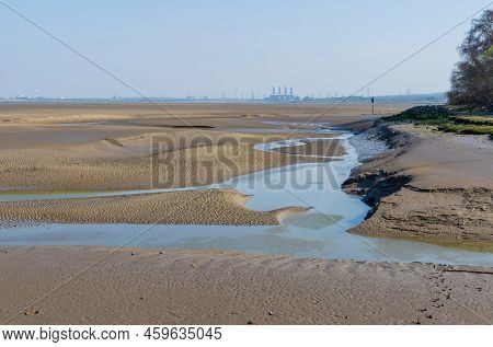 Flint Foreshore On The River Dee At Low Tide
