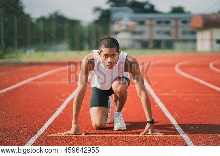 Hands Runner Ready Start To Run Athlete Sportman Training Run On Lane At The Stadium In Morning. Run