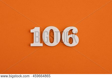 White Wooden Number 106 On Eva Rubber Orange Background