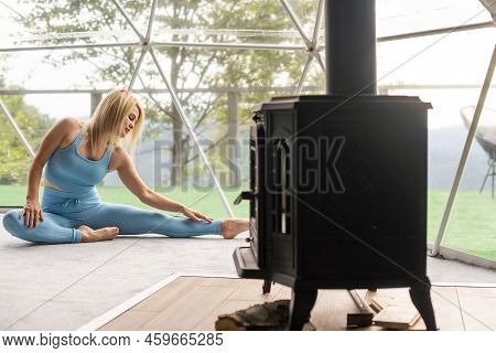 A Woman Is In A Geo Dome Glamping Tent. Glamping Vacation Lifestyle Concept.