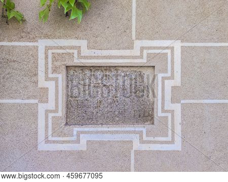 Roman Tombstone Built In Historic Quarter House. Roman Remains Still Visible At Sande Palace, Cacere