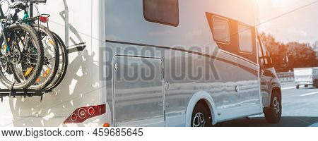 Scenic View Big Modern White Family Rv Camper Van Vehicle Driving On European Highway Road Against B