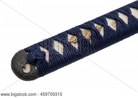 Close-up Tsuka : Handle Of Japanese Sword Wrapped By Navy Blue Silk Cord With Gold Fitting Isolated 