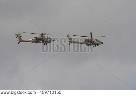 Jerusalem, Israel - May 5th, 2022: Two Israeli Air Force Boeing Ah-64 Apache Helicopters, Flying In 