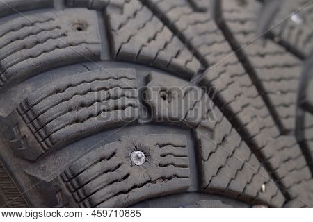 Old Winter Tires Of A Car With Torn Spikes For Not Sliding On Ice.