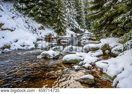Sunny Winter Afternoon At Jizera River Full Of Boulders Covered By Snow. Jizera Mountains, Czech Rep