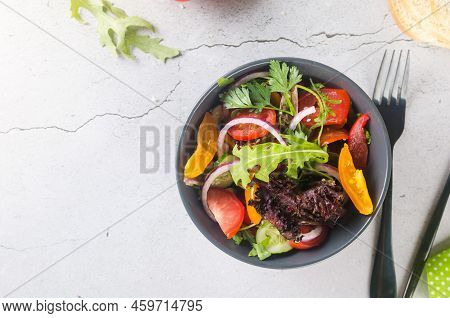Healthy Vegetable Salad With Fresh Salad Leaves, Arugula, Cherry Tomato, Cucomber And Parsley In Pla
