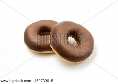 Two Donuts -tasty Dessert With Chocolate Glossy Glaze In A Plate, Isolated On White Background. One 