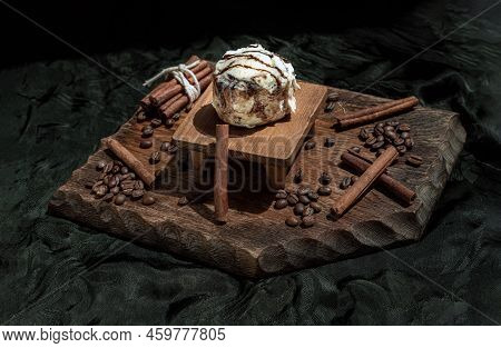 Chocobon (soft Chocolate Bun) Topped With Rich Cream Cheese Frosting And Cinnamon With Coffee Beans 